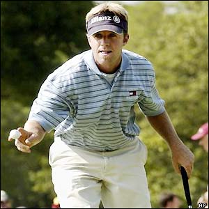 Qualier Brad Quigley celebrates a birdie on the 16th