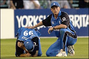 Michael Vaughan injures his shoulder and is comforted by Paul Collingwood during a one-day game with New Zealand in 2002