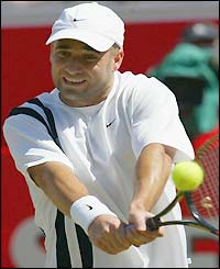 Agassi in action against Malisse