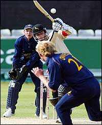 Nottinghamshire's Jason Gallian hits out against Durham's Mark Davies