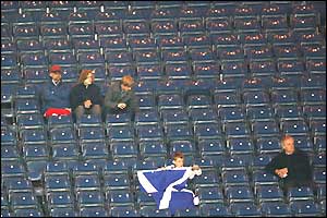 A very sparse crowd watch Scotland play Austria at Hampden Park