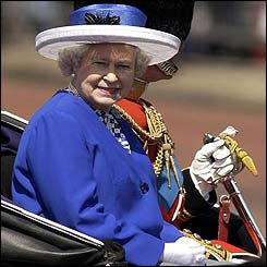 Queen, with Duke of Edinburgh behind