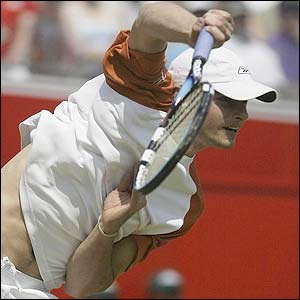 Andy Roddick serves to Agassi