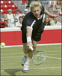 Becker volleys at the net