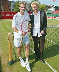Stefan Edberg and Boris Becker relax on centre court 