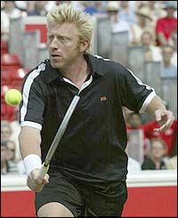 Becker volleys at the net