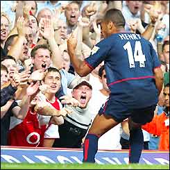 Thierry Henry celebrates scoring against West Ham in August