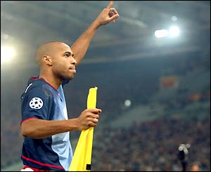 Thierry Henry celebrates scoring against Roma in November