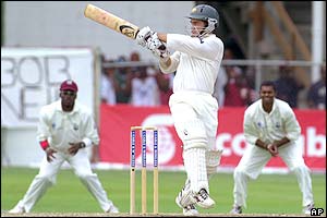 Australia's Justin Langer cuts the ball for four runs