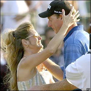 Jim Furyk is congratulated by his wife after winning the US Open