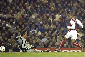 Thierry Henry scores his 100th goal for Arsenal against Birmingham