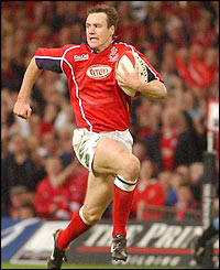 Mark Jones sprints to the line to score the first try of the Principality Cup Final.