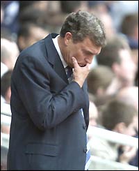 West Ham's caretaker-boss Trevor Brooking stands on the sidelines