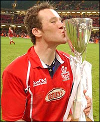 Man of the Match Mark Jones kisses the cup on the Millennium Stadium pitch.