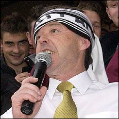 Swansea City's Director of Football Brian Flynn addresses the hundreds of delighted fans after avoiding relegation.