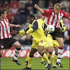 James Beattie rises high above Jay-Jay Okocha