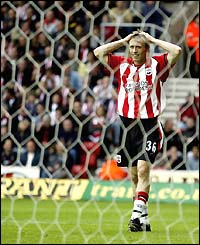 Brett Ormerod puts his hands to his head in dismay