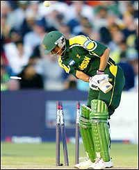 Younis Khan is clean-bowled by England's James Anderson