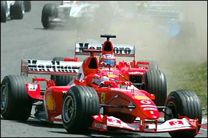 Michael Schumacher and Rubens Barrichello battle for the lead