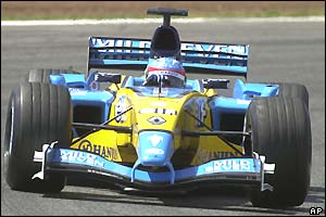 Home favourite Alonso briefly takes the lead as Schumi visits the pits