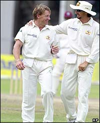 Andy Bichel and Jason Gillespie share a joke