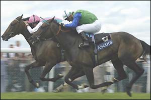 Spanish Sun, ridden by Richard Hughes, edges ahead to take The Ribblesdale Stakes
