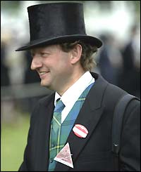 Trainer Mark Johnson watches as his horse Fantastic Love takes the King George V Stakes