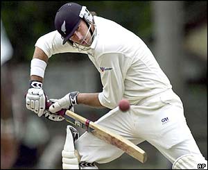New Zealand captain Stephen Fleming watches the ball pass the bat