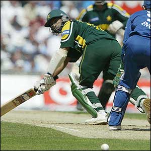 Yousuf Youhana sweeps the ball past Chris Read as he makes 75 