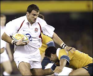 England captain Martin Johnson shrugs off a tackle