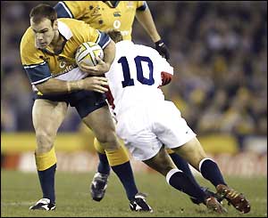 Jonny Wilkinson puts in a tackle for England