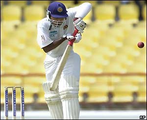 Mahela Jayawardene is caught out by Windies captain Brian Lara
