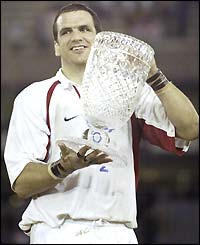 England captain Martin Johnson lifts the Cook Cup