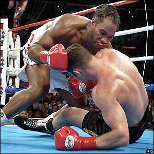 Lewis and Klitschko tumble to the canvas