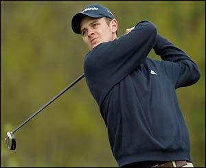 Justin Rose tees off on the fifth