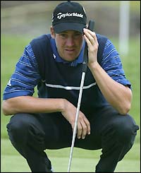 Tobias Dier ponders the lie of the green