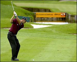 Padraig Harrington lines up at the 10th hole and is hot on the heels of Dixon