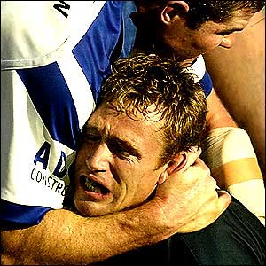 Melbourne Storm's Matt Orford is gripped by Canterbury Bulldogs' Andrew Ryan in the ARL 