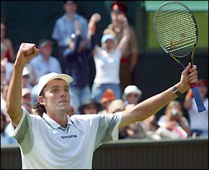 Ivo Karlovic celebrates his remarkable victory