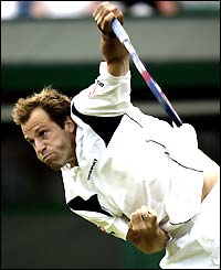 Greg Rusedski in action at Wimbledon