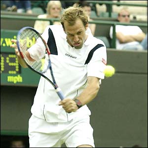 Greg Rusedski faces Germany's Alexander Waske on Court One