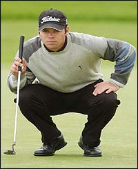 England's Paul Casey surveys a putt