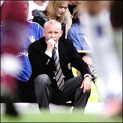 Peter Reid watches his Leeds team in action