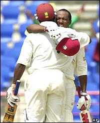 Brian Lara celebrates scoring 209 with team-mate Ridley Jacobs
