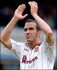 West Ham striker Paolo Di Canio applauds the Hammers fans 
