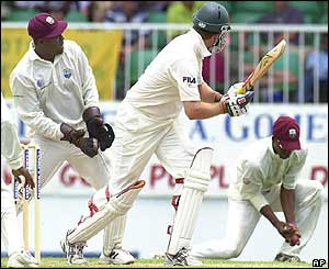 Australia's Martin Love edges an Omari Banks delivery to Marlon Samuels at slip