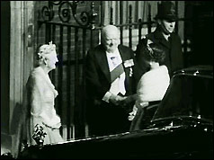 Winston Churchil greets the Queen