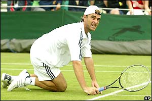 Olivier Mutis is floored as Paradorn Srichaphan hits a winner past him