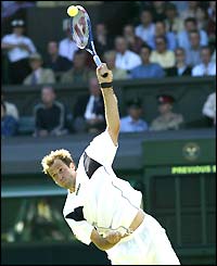 Greg Rusedski serves