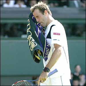 Rusedski feels the heat as he goes down by two sets against Andy Roddick
